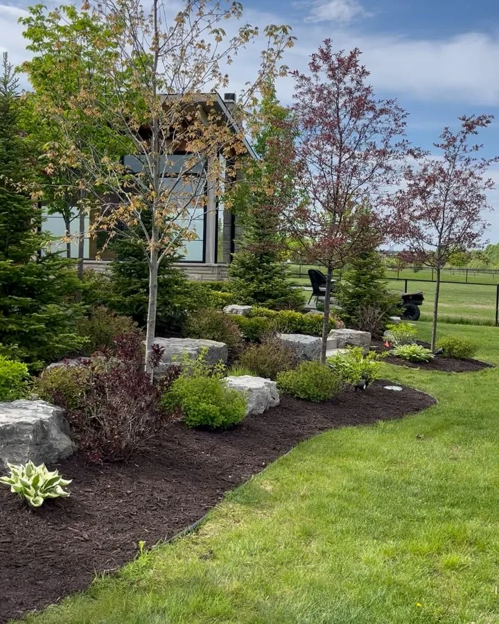 Completed a full garden bed refresh today with 8 yards of premium brown mulch.