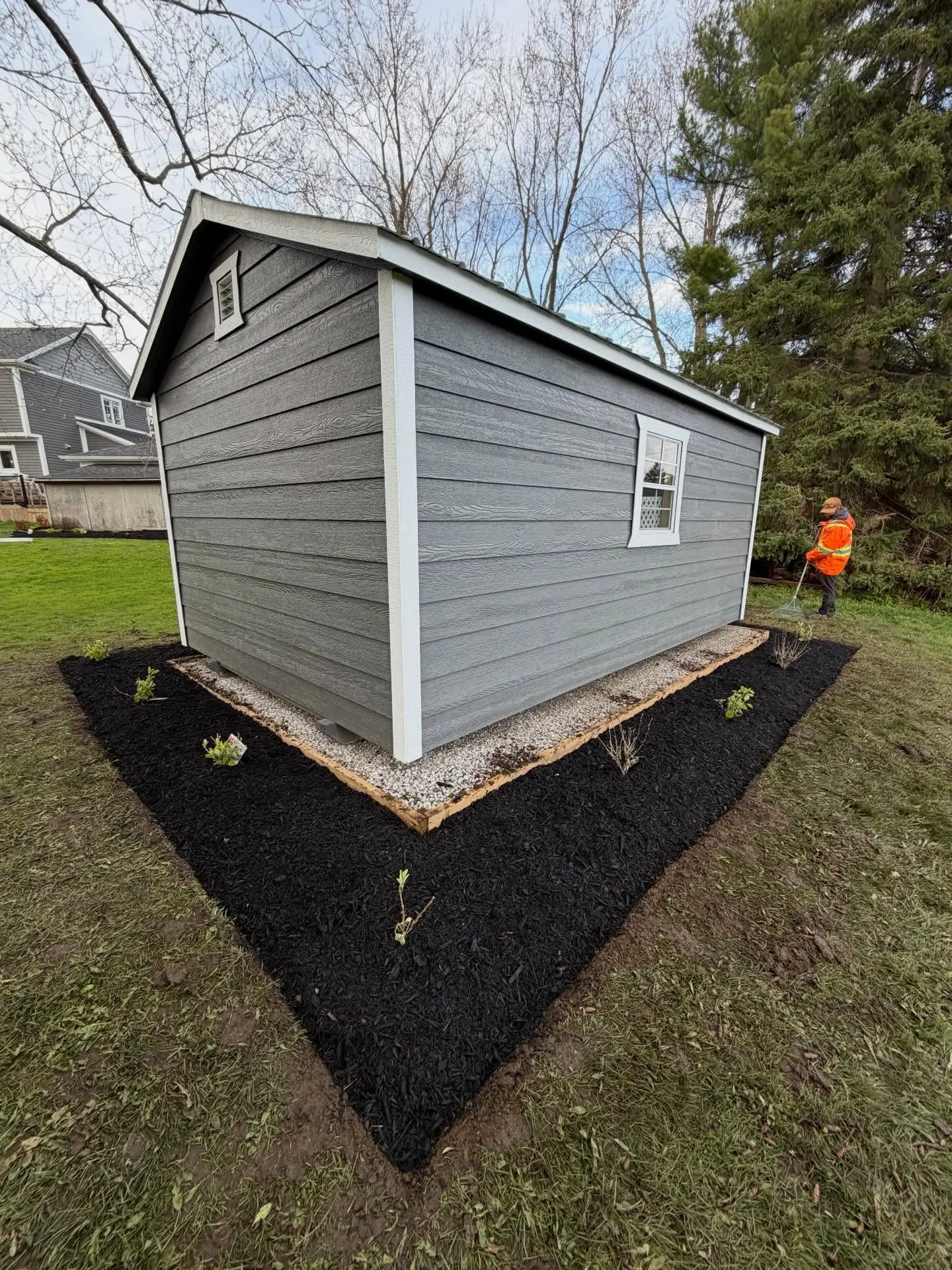 We’re back at it, turning a blank space around the shed into a brand-new focal point.