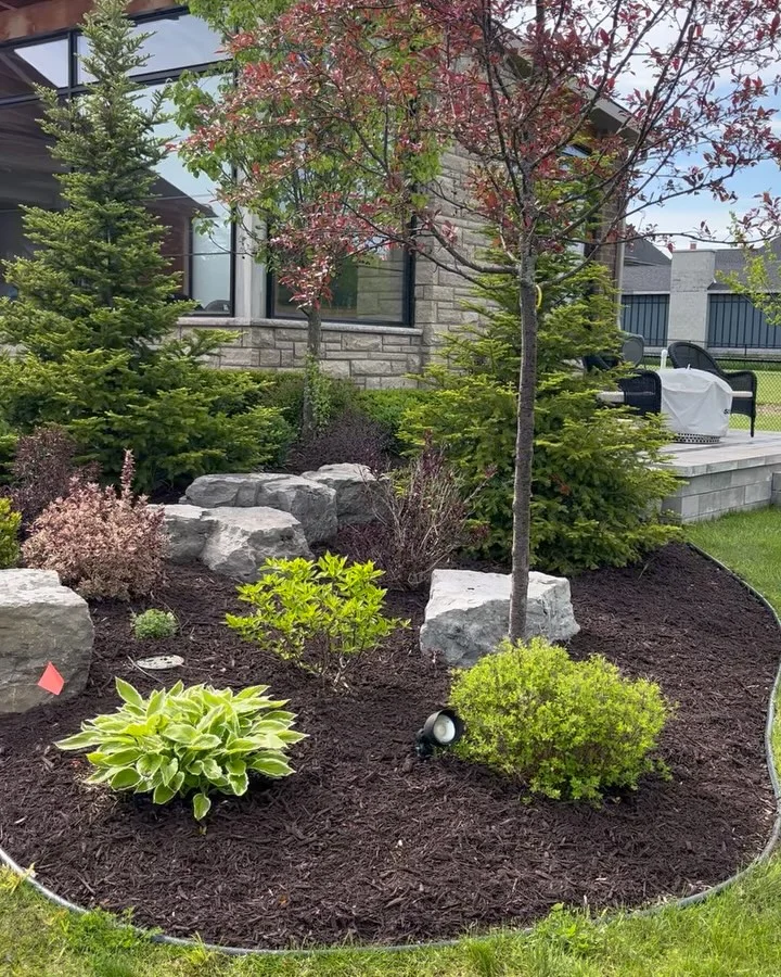 Completed a full garden bed refresh today with 8 yards of premium brown mulch.