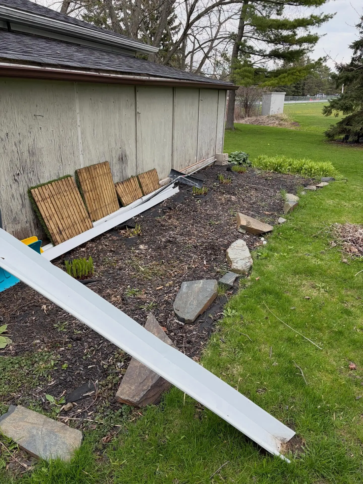 We’re back at it, turning a blank space around the shed into a brand-new focal point.