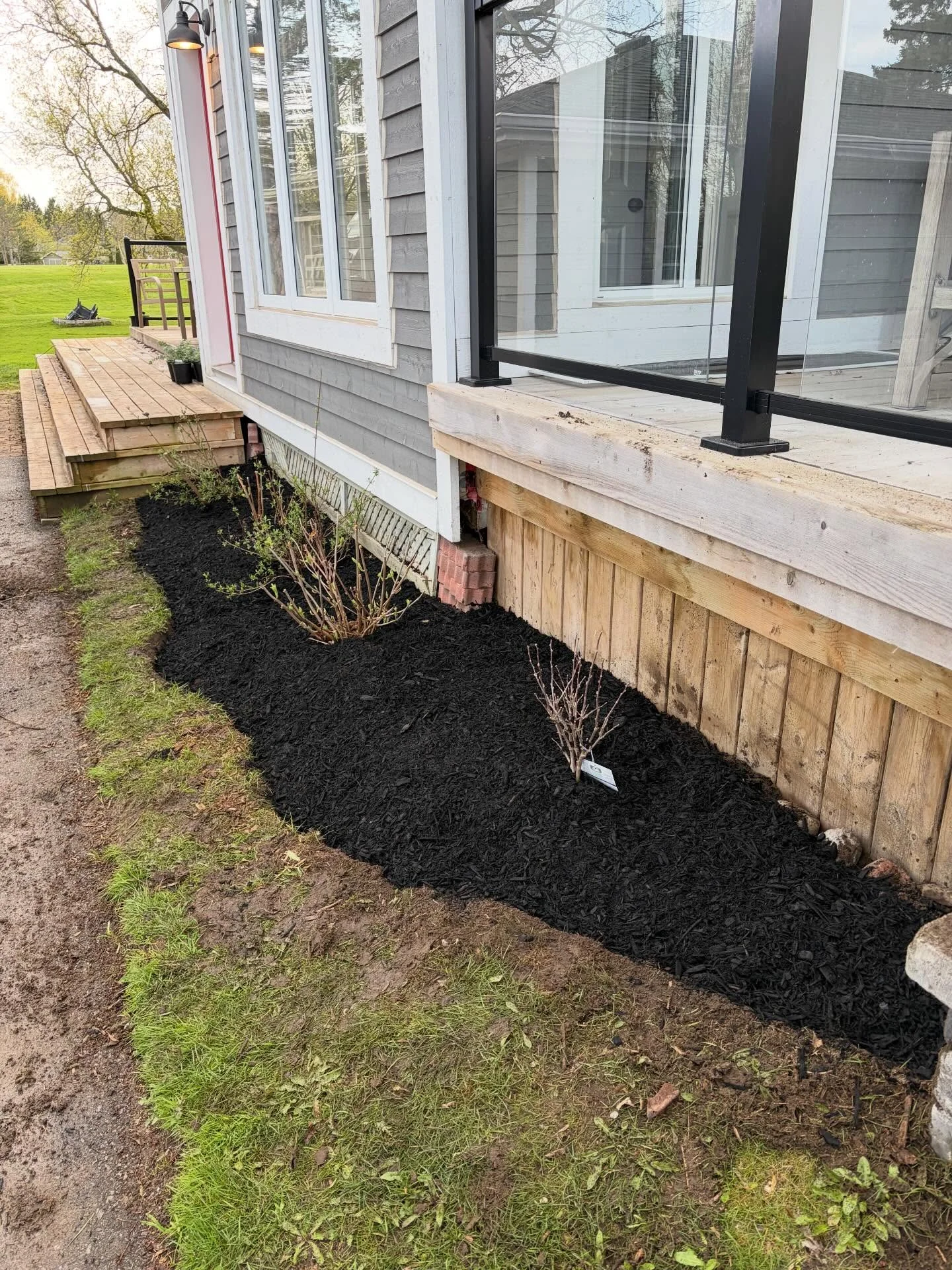 We’re back at it, turning a blank space around the shed into a brand-new focal point.