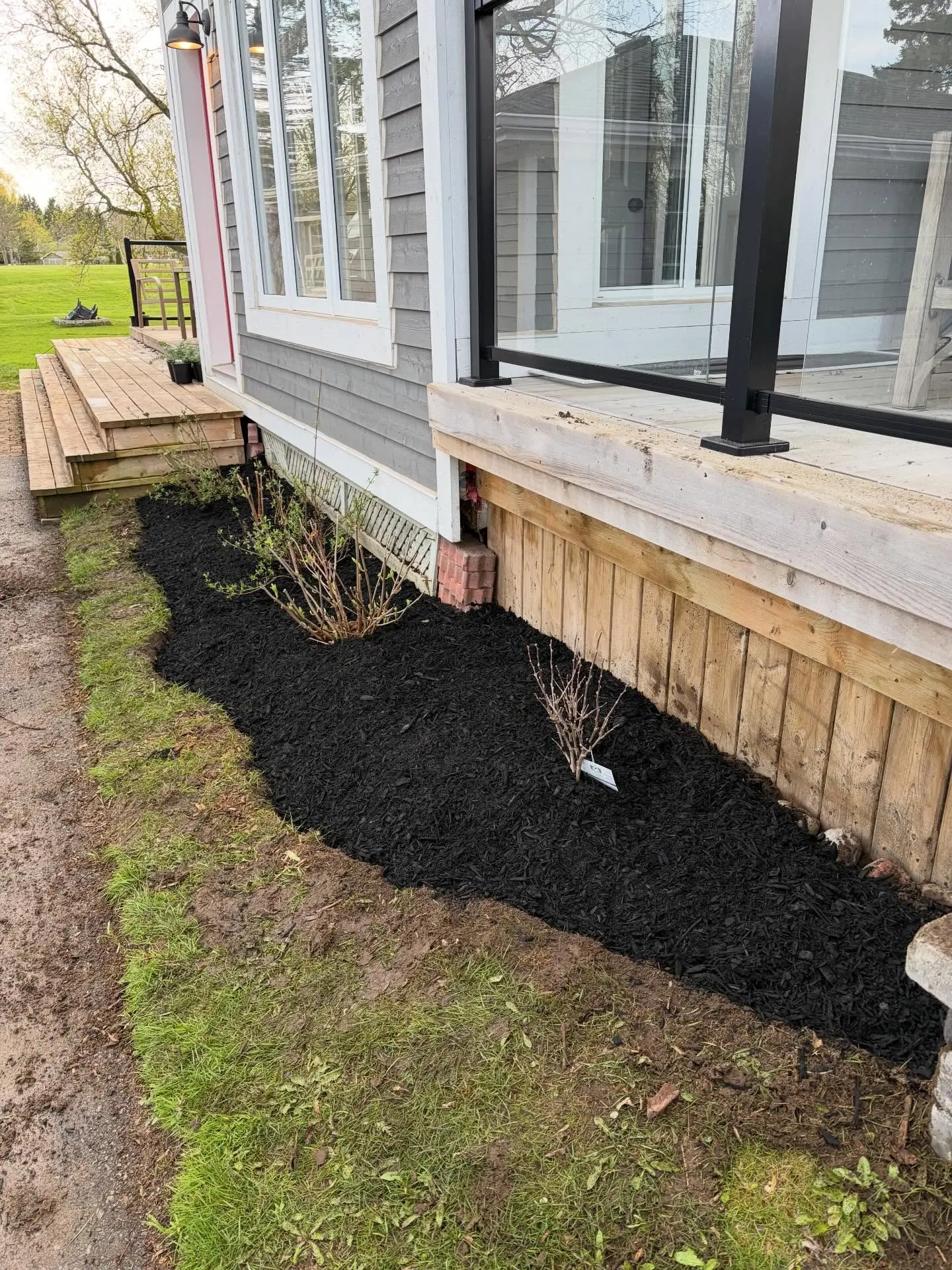 We’re back at it, turning a blank space around the shed into a brand-new focal point.