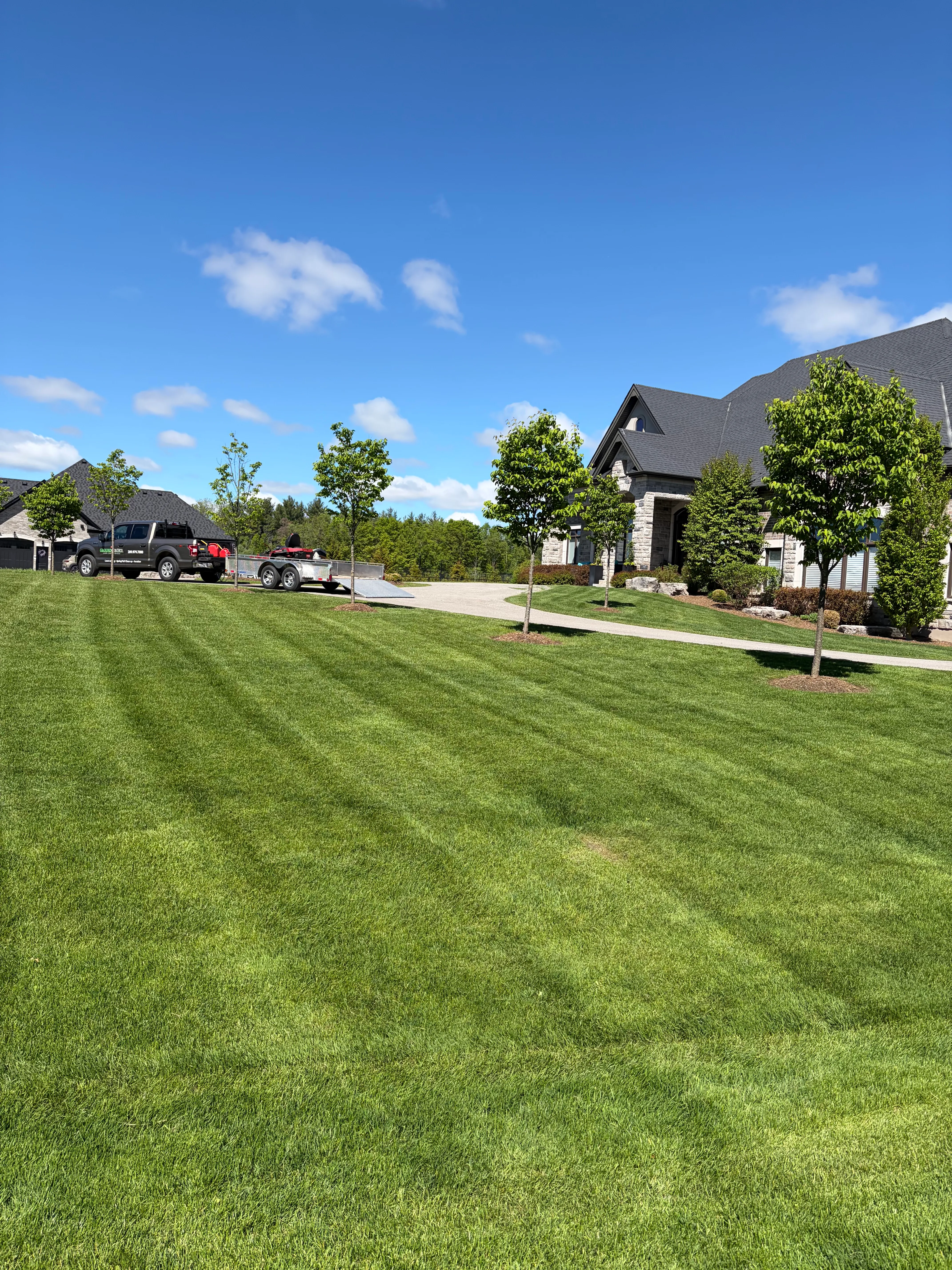 Freshly cut, striped residential lawn in Durham Region